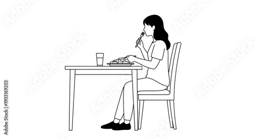 Woman eating a meal at a table with a glass of water.