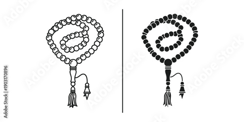 Rosary beads in black and white on plain background