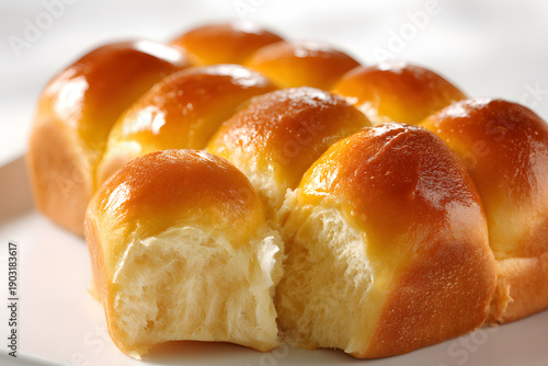 Wallpaper Mural Isolated Cluster of Soft Hawaiian Sweet Rolls on White Plate with a Light Background Torontodigital.ca