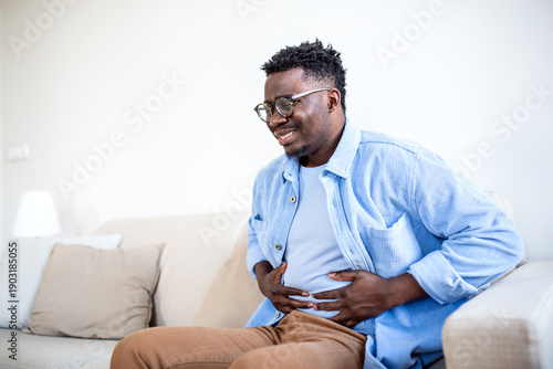Fotografie African American Man with Stomach Ache