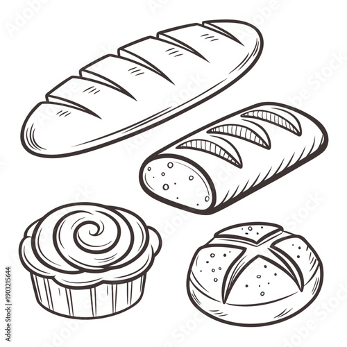 Assorted breads and pastries displayed on a table in a bakery setting