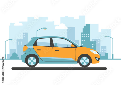 Modern orange car parked in front of a cityscape with tall buildings and streetlights viewed from the side