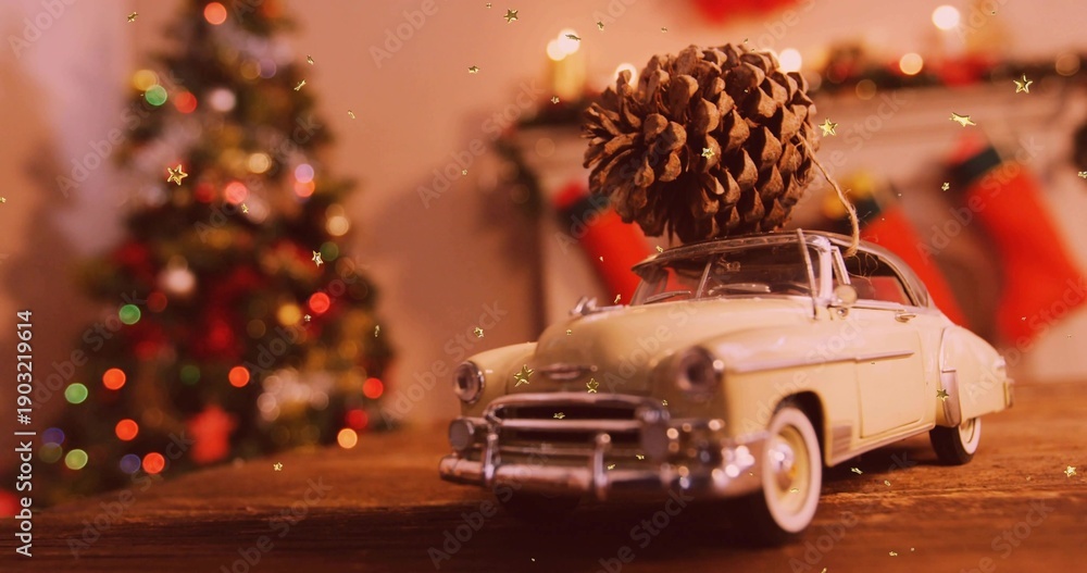 Fototapeta premium Displaying cream car carrying pinecone tied with twine on tabletop in living room, mantel and tree