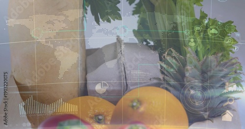 Displaying centered fruit still life on gray cloth with oranges, pineapple, ginger, digital overlay