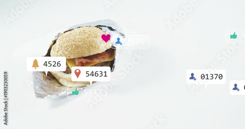 Badges appearing at right edge drifting clustering fading around foil burger showing social buzz