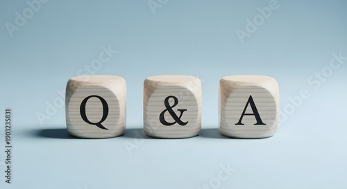 Wooden blocks spelling Q and A for questions and answers