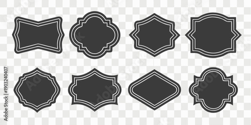 A collection of 24 unique, black, label-shaped silhouettes arranged on a transparent, checkered background. The labels vary in shape and size, each featuring a black fill outlined by a thin, white bor