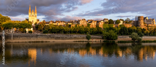 Bild auf Leinwand Sunset scenery in beautiful city of Angers in France, with famous chateau and ca