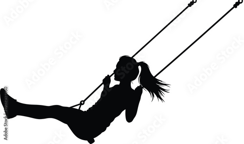 Silhouette of a girl swinging on a swing set with ropes