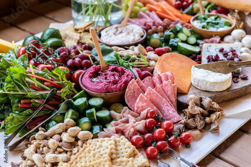 Εκτύπωση καμβά Vibrant catering spread on a wooden table at a campsite near Lake Yamanaka