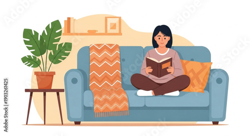 Young woman reading a book while sitting comfortably on a sofa.