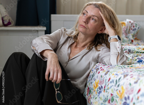 sad woman in her forties perimenopause symptoms