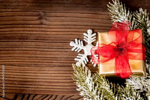 packaging christmas gifts in boxes on wooden background top view