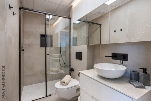 Modern Minimalist Bathroom Interior With Glass Shower And Vanity