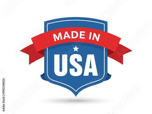 A blue shield with a red ribbon displaying 'Made in USA' on a white background from a straightforward viewpoint.