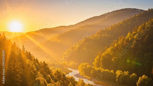 Sun rises over the forested mountains, casting a golden glow on the winding river below, creating a serene landscape.
