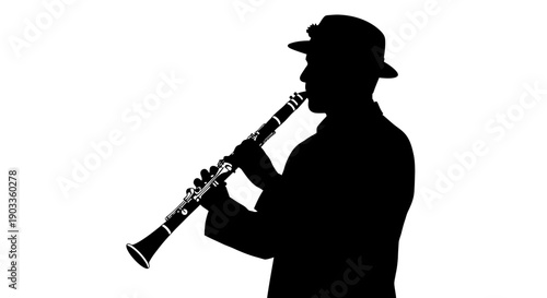 Silhouette of a man playing the clarinet with a hat on.