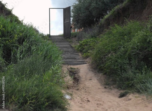 An open door leading to nowhere. Bottom view.