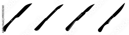 Set of four surgical scalpels isolated on white background for medical and precision use