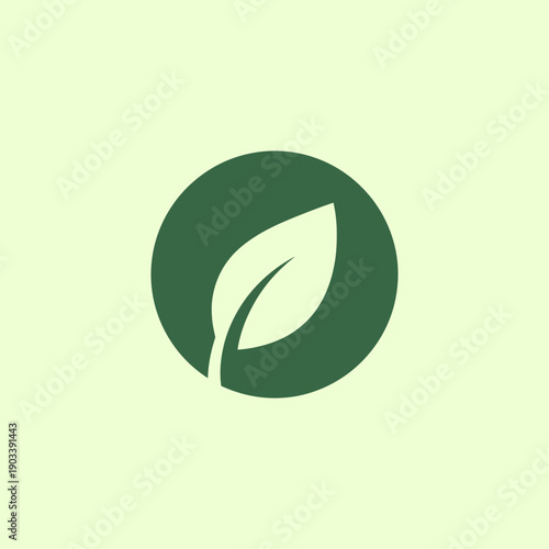 Minimalist Green Leaf Icon in Circle on Light Green Background, Nature and Ecology Symbol