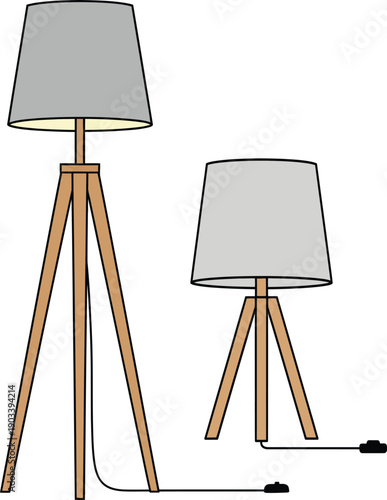 Two floor lamps with wooden tripod bases and grey lampshades one tall and one short on a white background