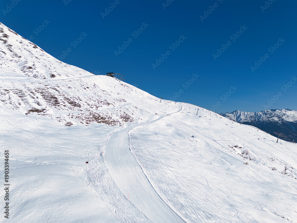 Obraz premium Winter time in the Austrian Alps, ski slopes, skiing, snowboarding