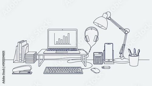 Desk setup with laptop, headphones, calculator, phone, and lamp.