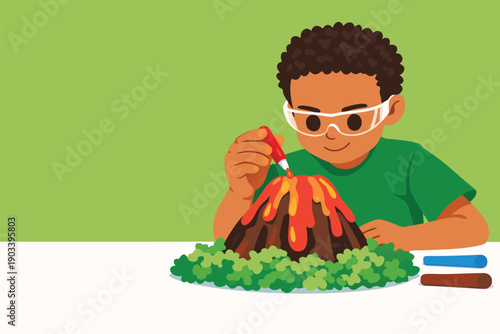 School boy wearing safety glasses conducting a volcanic eruption experiment in class.