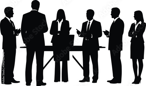 Business professionals gathered around a table in a meeting