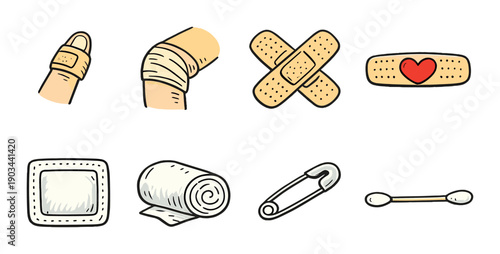 Collection of first aid items including bandages and safety pin