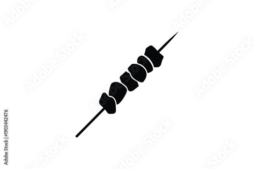 Shish kebab on a skewer with meat and vegetable pieces, black silhouette on white background