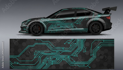 A black car with a teal circuit board graphic wrap design.