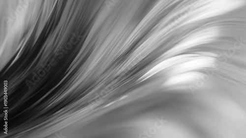 Black and white abstract background with a wave-like pattern. the wave appears to be moving in different directions, creating a sense of movement and energy.