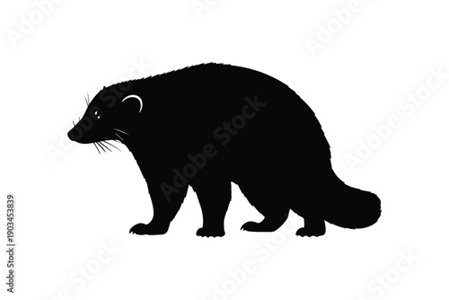 Wolverine silhouette profile view standing wild predator animal symbol boreal forest wildlife nature hunting