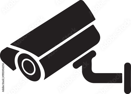  Black and white image of a security camera mounted on a wall, capturing surveillance footage in a modern environment