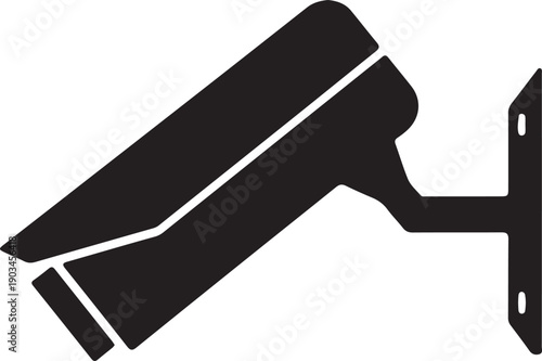 Black and white image of a security camera mounted on a wall, capturing surveillance footage in a modern environment