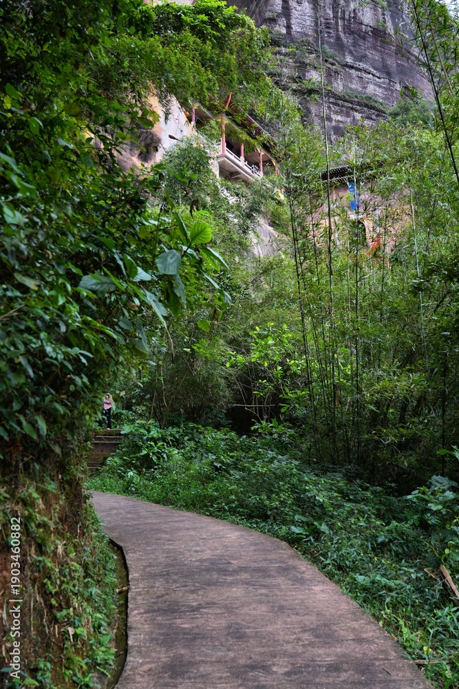 Fototapeta premium Trail to Xianju Taoist rock temple in Danxia Mountains (Danxiashan) in Renhua County in Shaoguan (Guangdong Province), China.