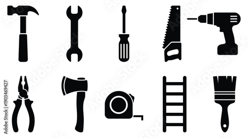 Collection of black silhouette tools on white background