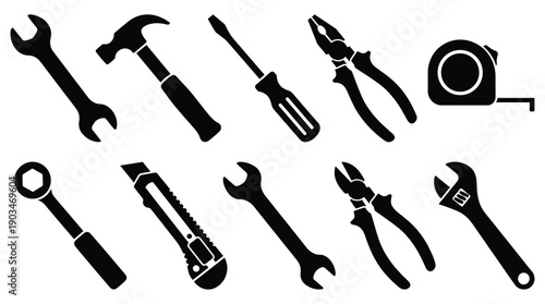 Collection of black tool silhouettes on white background