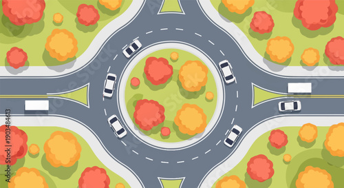 Top view of a busy roundabout with cars and trucks moving