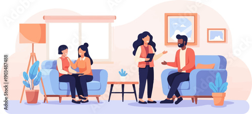 Three people in a room, two women seated on a couch, one woman and one man talking