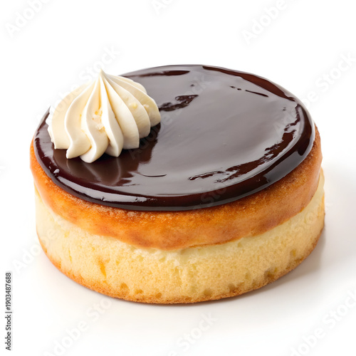 A delicious Boston cream pie with chocolate glaze and whipped cream on top
