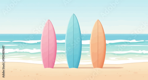 Three colorful surfboards stand on a sandy beach with ocean waves