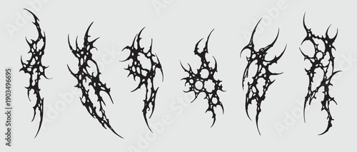 Adobe Illustrator ArtworkSet of Cyber Sigilism Tattoo Elements. Gothic Abstract Sharp Vector Shapes for Streetwear Design and Y2K Neo-Tribal Aesthetic. Black Edgy Graphic Assets Isolated.