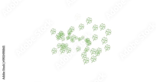 Multiple clover leaves floating and yellow light trails against white background