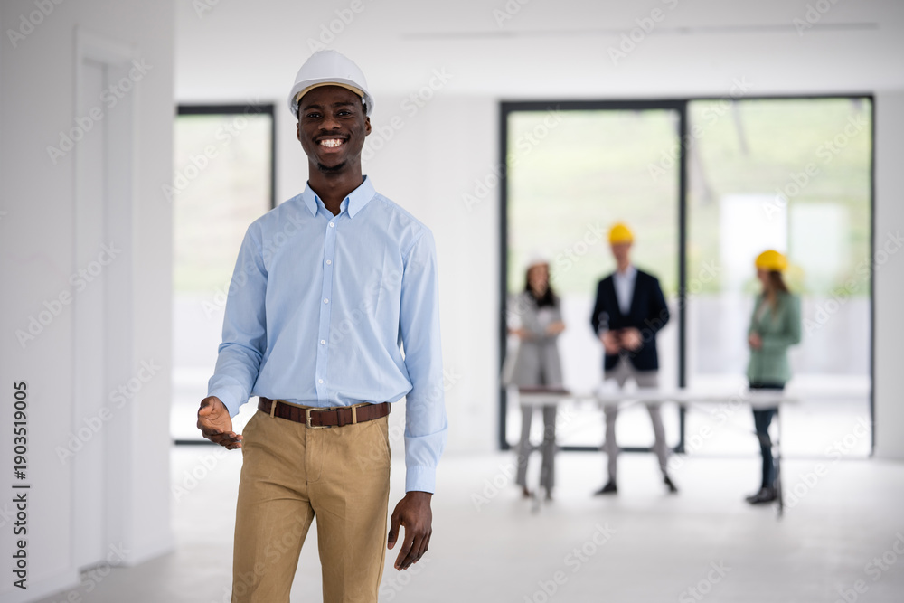 Fototapeta premium African american architect worker smiling on construction site