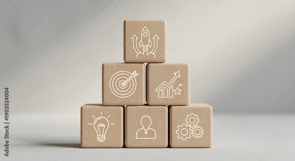 Fototapeta premium Startup strategy illustrated with wooden blocks: A conceptual image illustrating startup strategy.