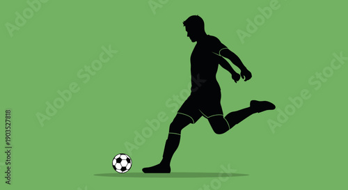 Silhouette of a male soccer player in action kicking a football on a vibrant green field background.