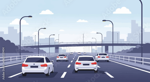 White cars driving on a highway under an overpass with city skyline