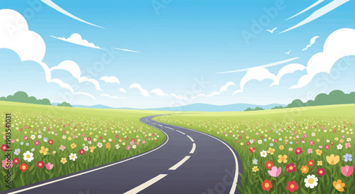 Winding road through a vibrant field of wildflowers under a clear blue sky